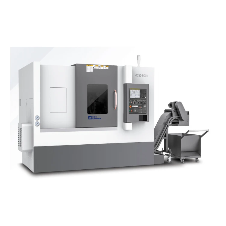 A white and orange machining center enclosure marked MC52-500Y, a turning-and-milling compound machine